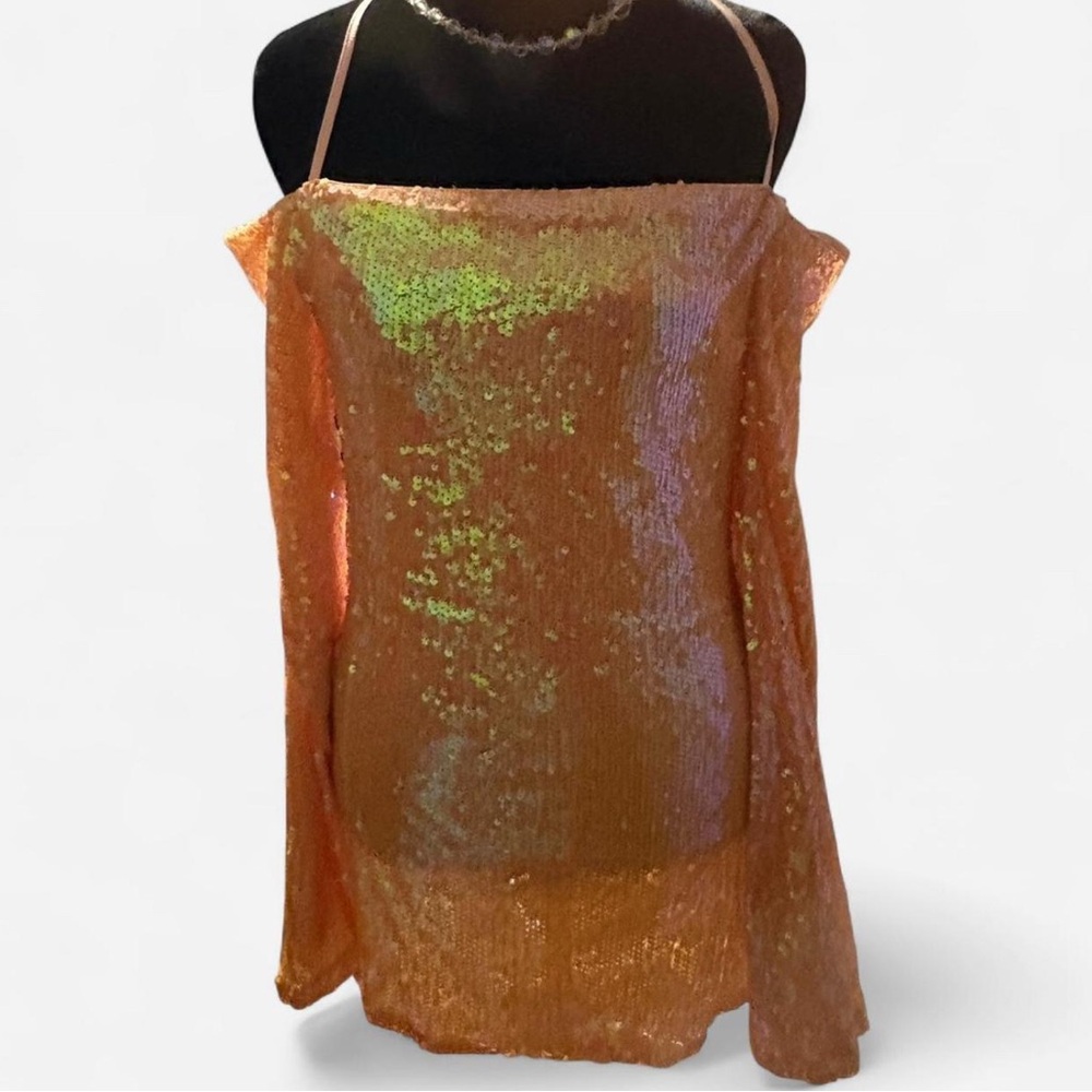 Pink sequin off-the-shoulder top with long sleeves
New with tags!